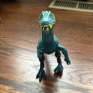 Blue and Yellow Action Figure Dinosaur with Fierce Features